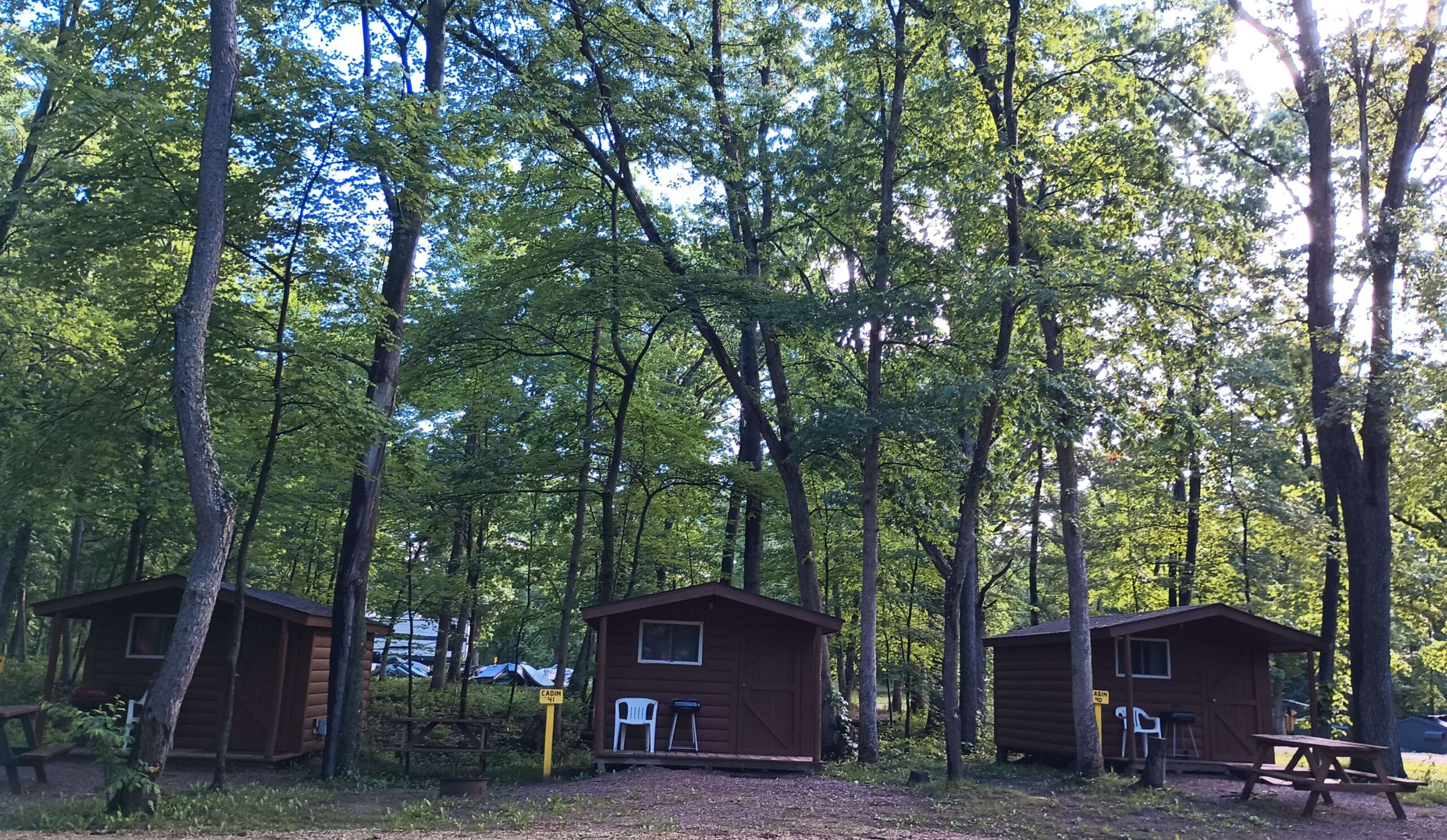 Small rustic sleeping cabin at Nature's Touch Campground Wisconsin Dells